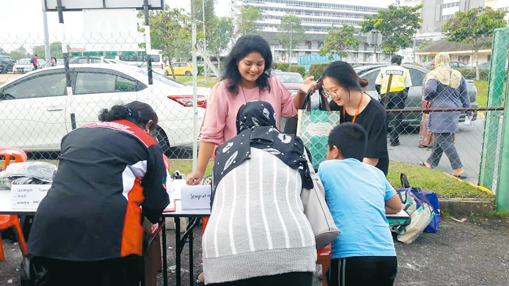 洪俐媛在Malaysian Care機構服事PLUS（HIV病患者）群體。